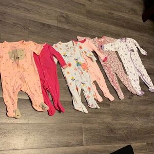 **Six baby girl footies for one price**
